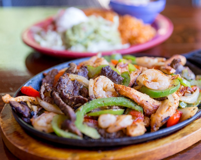 Shrimp and Steak with peppers fajitas