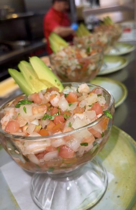 Shrimp ceviche cups garnished with avocado